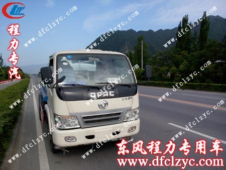 东风劲卡洒水带喷药车与美景