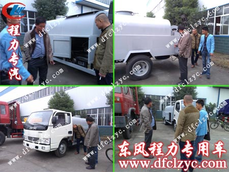 汪先生在高压清洗车车间看车
